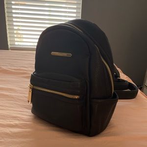 Black Steve Madden mini backpack